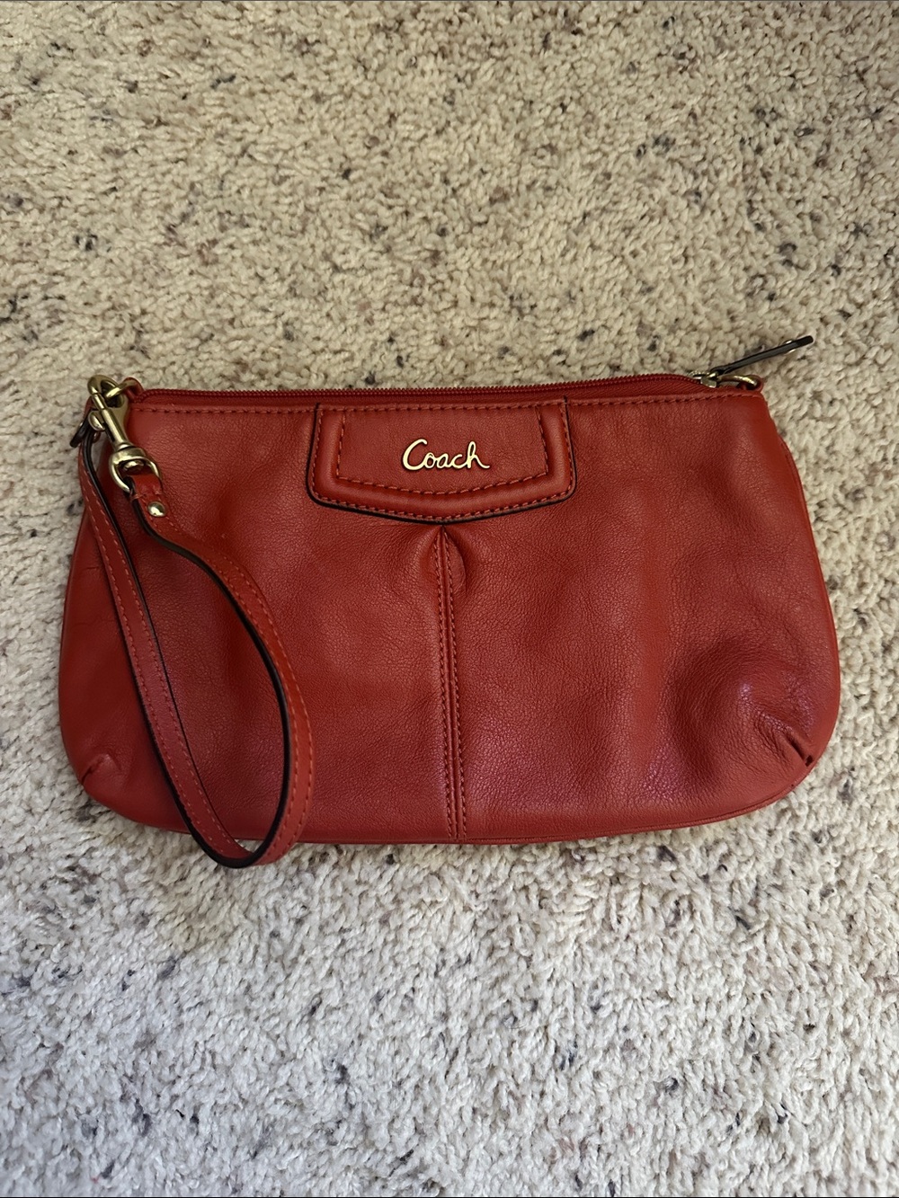 Coach burnt orange Leather Wristlet Clutch with Gold Hardware